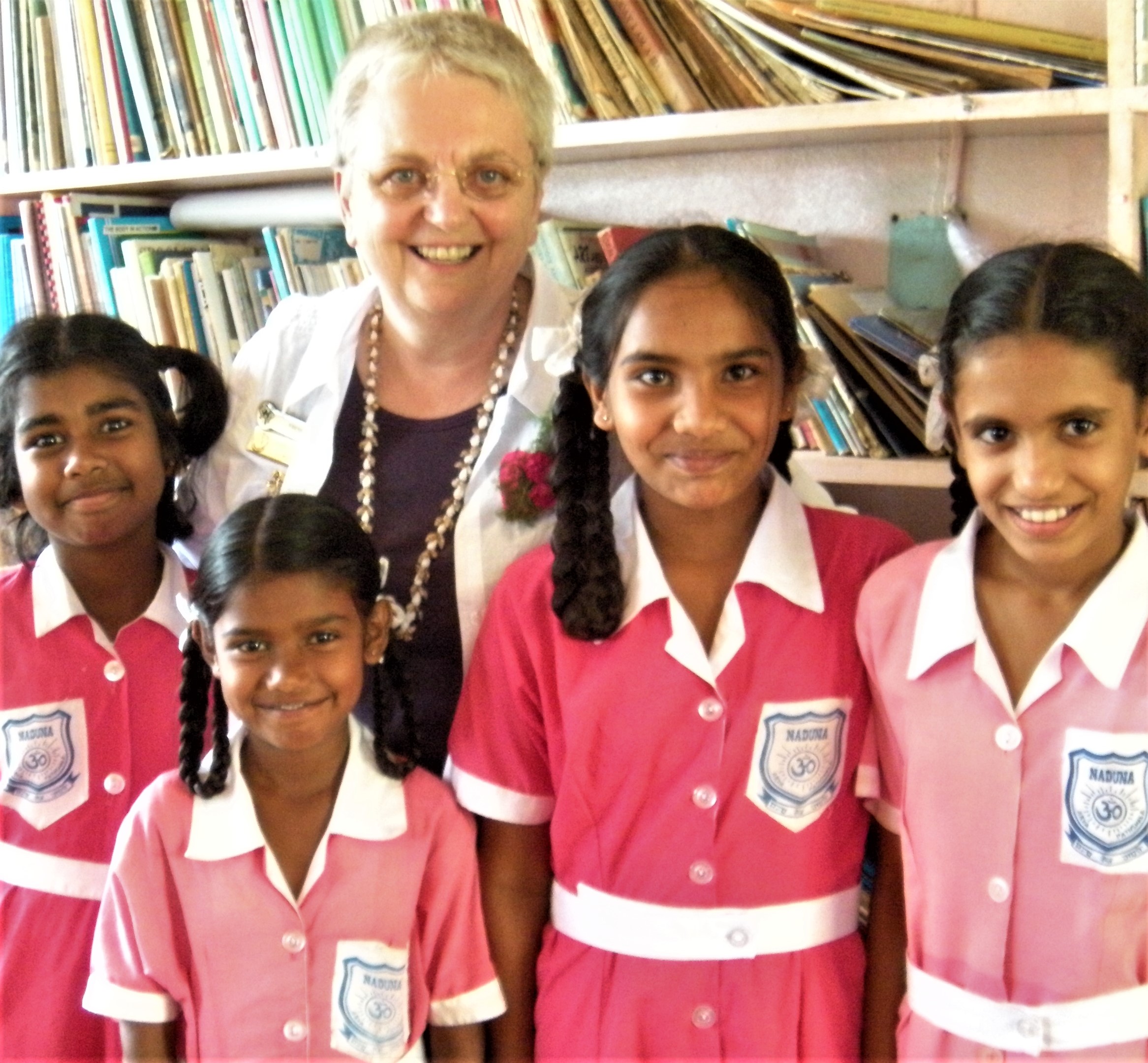 Yvonne Simpson with school girls Labasa